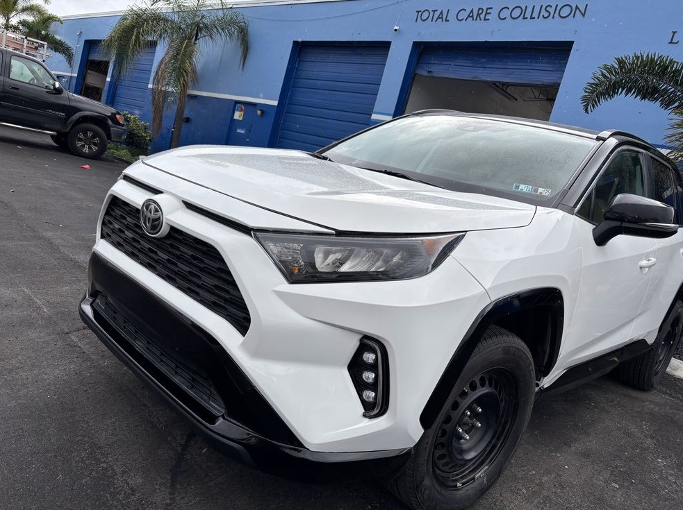 Same Toyota RAV4 rebuilt and road ready after structural and paint work in Pompano Beach FL