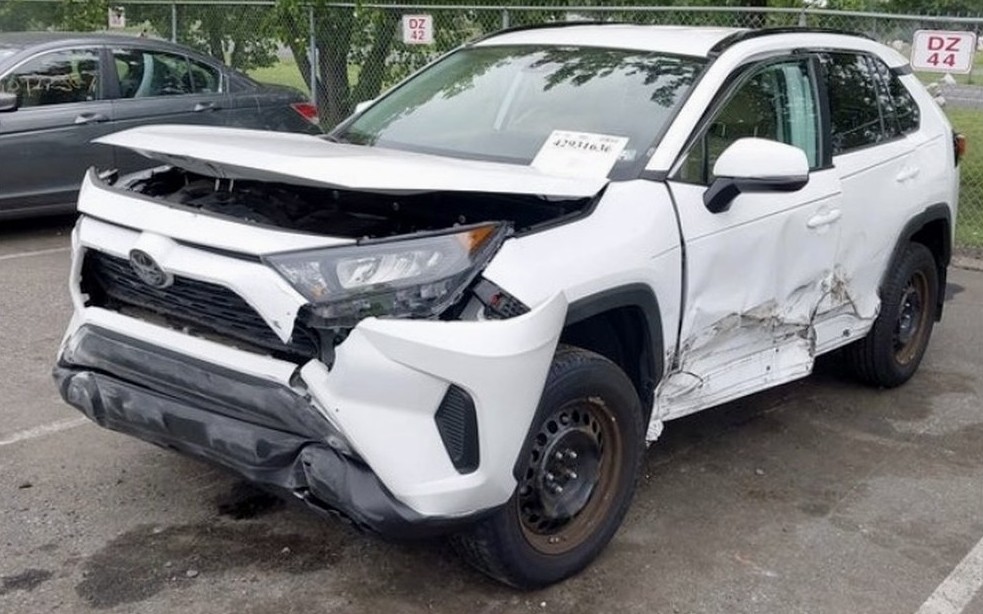 Toyota RAV4 declared a total loss, front end destroyed, before rebuild at Total Care Collision in Pompano Beach FL