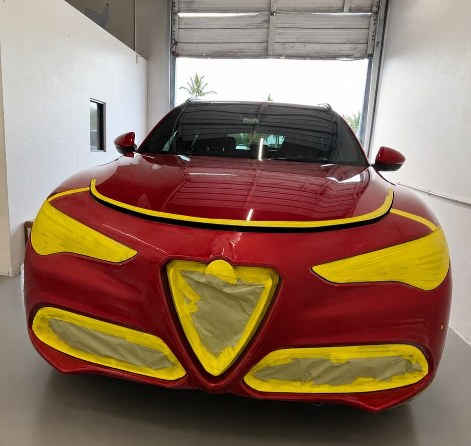 Alfa Romeo Stelvio masked for surface preparation before paint at Total Care Collision, Pompano Beach FL