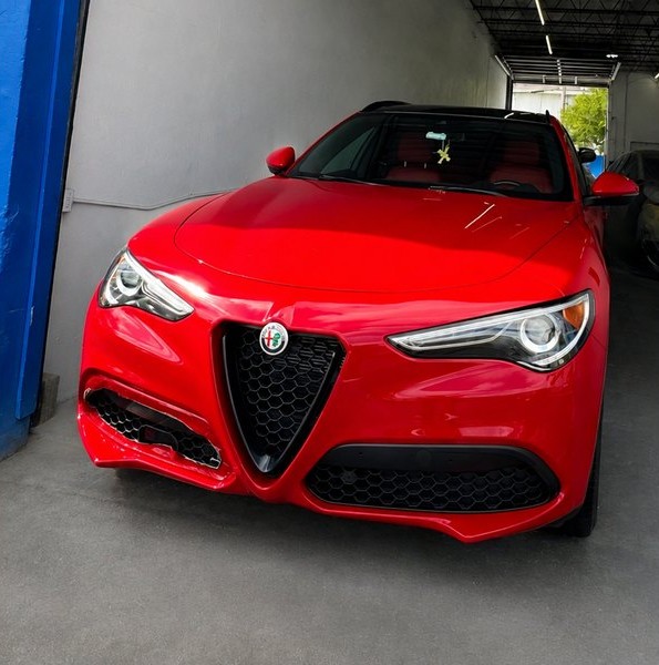 Alfa Romeo Stelvio delivered after paint refinishing, Total Care Collision Pompano Beach FL