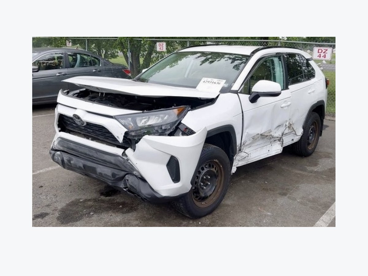 Toyota RAV4 declared a total loss, front end destroyed, before rebuild at Total Care Collision in Pompano Beach FL
