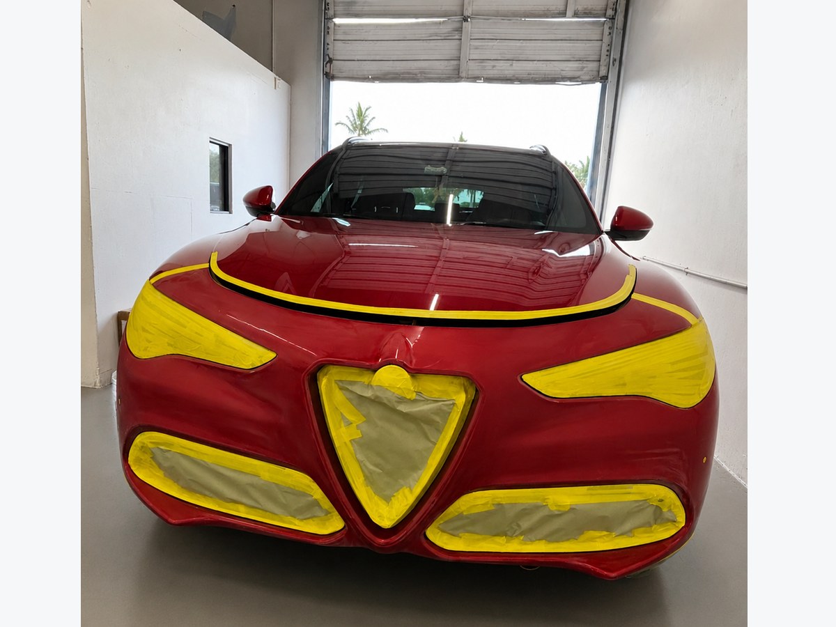 Alfa Romeo Stelvio masked for surface preparation before paint at Total Care Collision, Pompano Beach FL